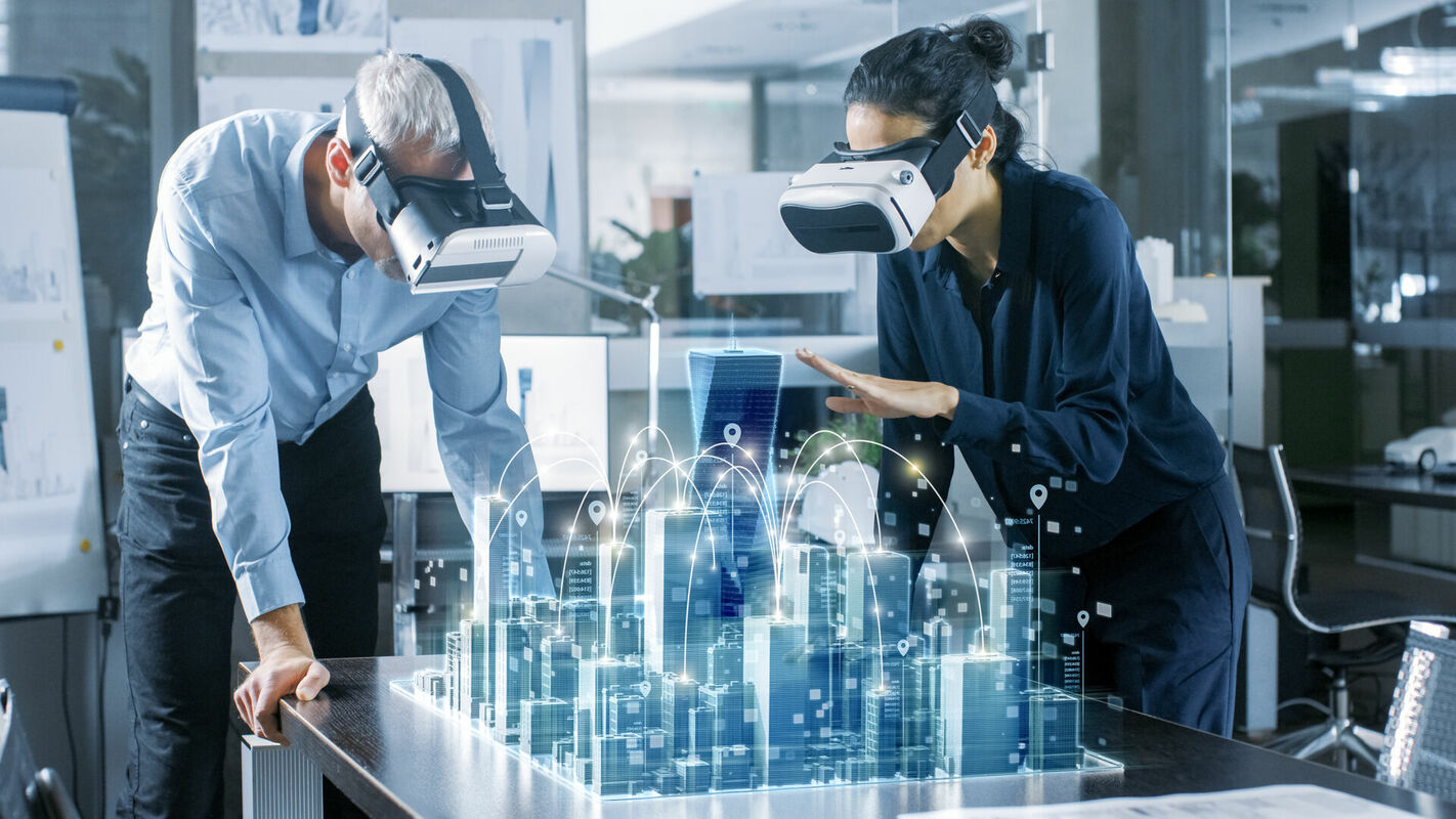 High tech office: Professional people use virtual reality modeling software application.
